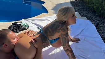 Pretty Blonde With Natural Big Boobs And A Tattooed Ass Swims In The Pool With A Cock In Her Pussy.